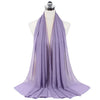 A lilac chiffon hijab scarf draped around a mannequin's neck.