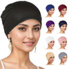 A display of a black breathable cotton underscarf with elastic fit in various shades of purple and pink on a model's head.