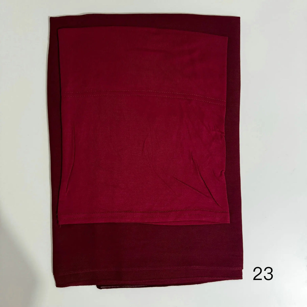 A solid maroon hijab set made of soft modal rayon fabric.