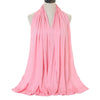 A pink soft modal jersey hijab scarf draped around a mannequin's neck.