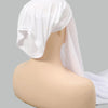 A white chiffon instant hijab is displayed on a mannequin head.