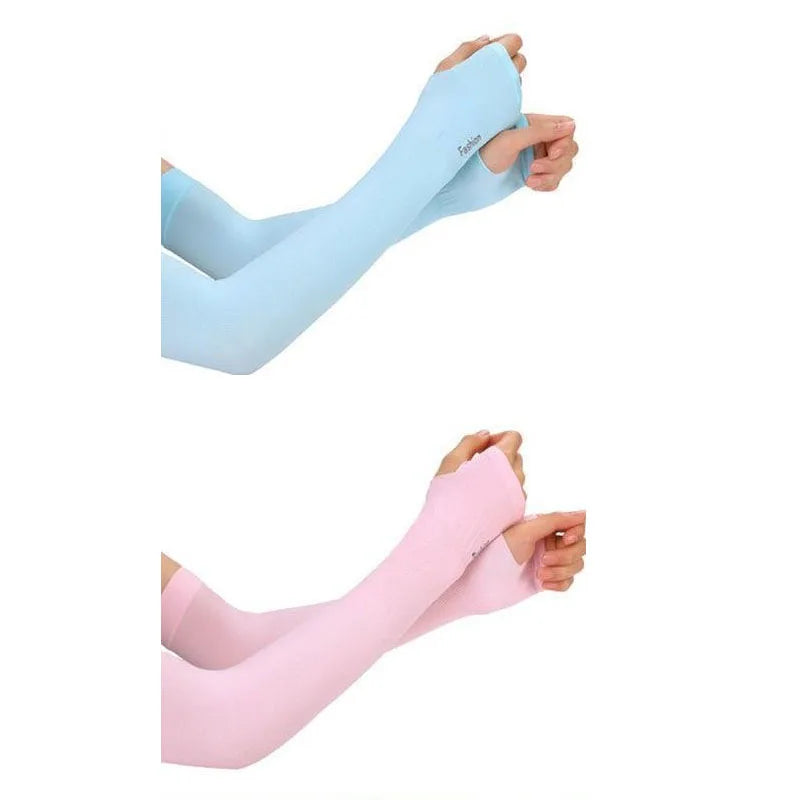 A pair of light blue cooling UV protection arm sleeves being worn on an arm.