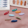 Colección de pines y clips de hijab de plástico de varios colores, incluyendo rosa, naranja, azul y verde.