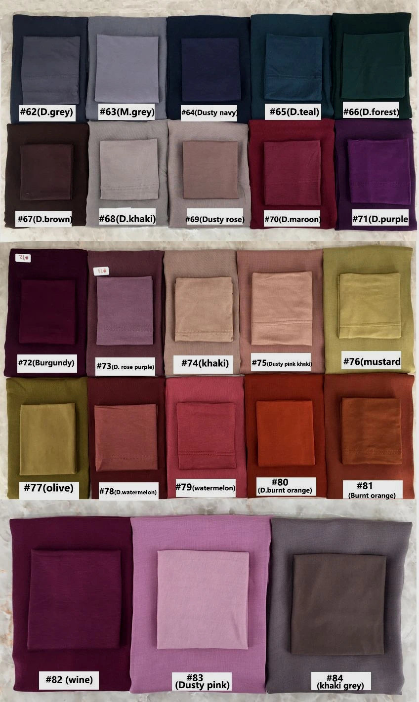 A collection of deep and muted colored fabric squares, including shades of purple, brown, olive, and pink.