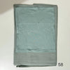 A folded soft teal hijab set made of modal rayon fabric.