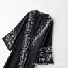 Black abaya with silver floral embroidery and a matching 3-piece set