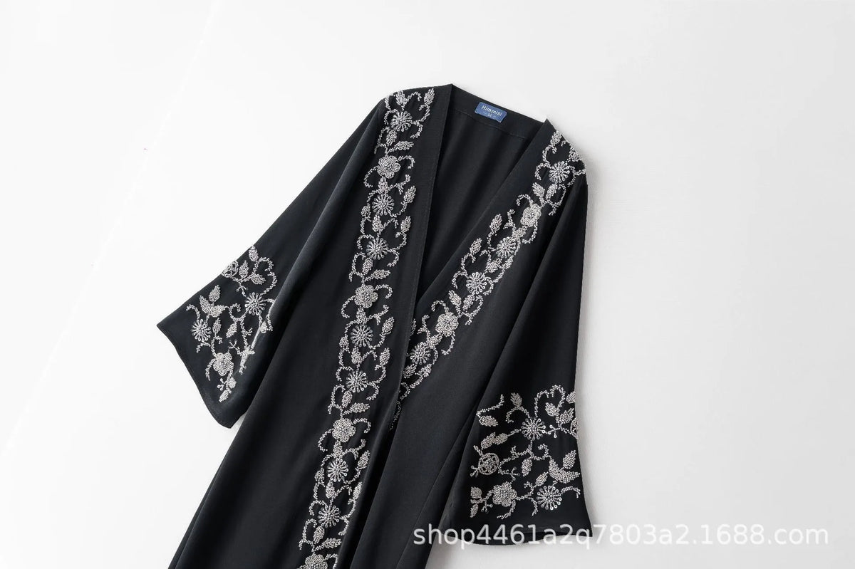 Black abaya with silver floral embroidery and a matching 3-piece set