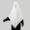 A white square scarf for Islamic wear displayed on a mannequin, paired with a black garment.