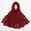 Étoffe de rayon crinklée couleur bordeaux profond drapée et fluide