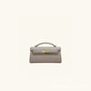 A light gray premium crocodile pattern shoulder bag with gold hardware.