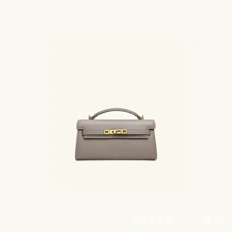 A light gray premium crocodile pattern shoulder bag with gold hardware.