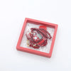 A red square box contains Islamic tasbih prayer beads and digital counter bracelets.
