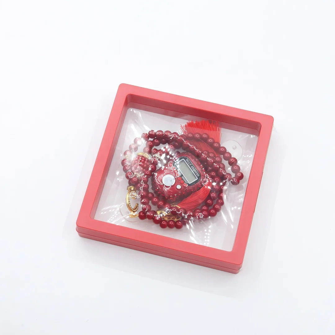 A red square box contains Islamic tasbih prayer beads and digital counter bracelets.
