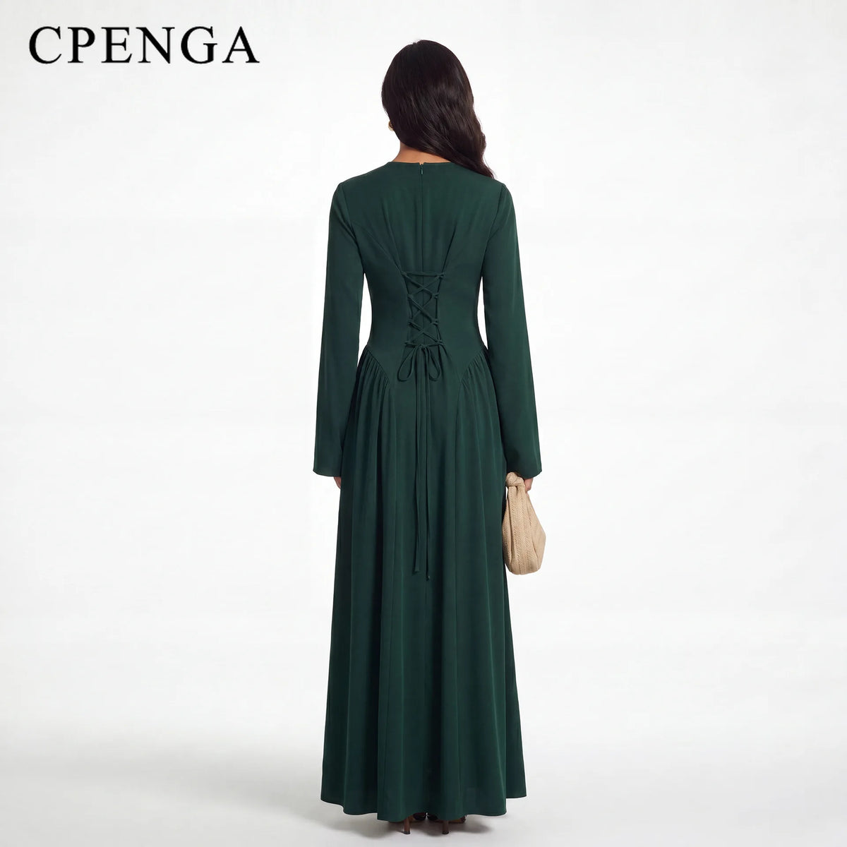 Abaya verde oscuro de largo completo con mangas largas y cintura ajustable, vista desde atrás.