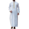 White embroidered men's thobe long-sleeve Islamic jubbah worn by a man.