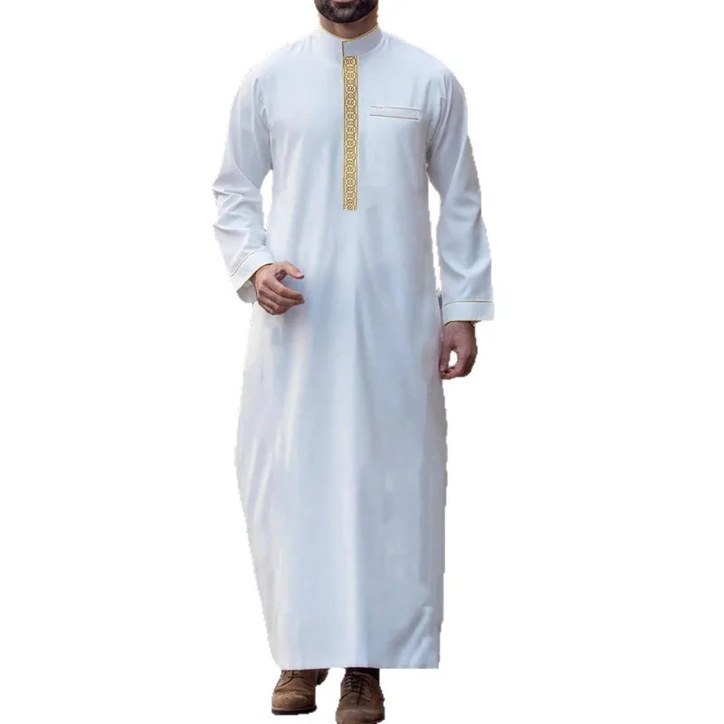 White embroidered men's thobe long-sleeve Islamic jubbah worn by a man.