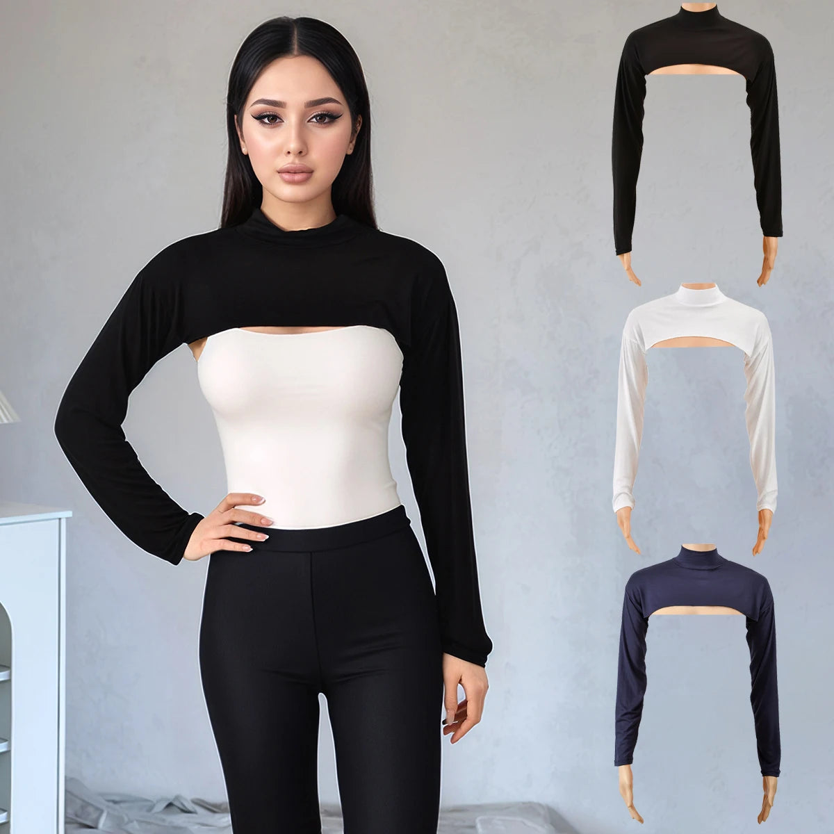 Eine Frau modelliert ein schwarzes Langarm-Top und schwarze Hose, mit separaten weißen und dunkelblauen Versionen an Kleiderb