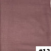 Gros plan sur un foulard modal de couleur rose poussiéreux.