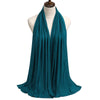 A teal premium modal jersey hijab draped around a mannequin's neck.