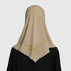 Beige, sofort fertiges Hijab-Kleid mit goldenen Stickereien auf schwarzem Stoff.