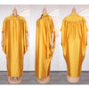 Helle gelbe Luxus-Afrikanische Kaftan-Abaya auf einem Mannequin.