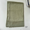 A folded olive green soft modal rayon hijab set for women.