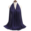 A deep indigo premium modal jersey hijab draped around a mannequin's neck.