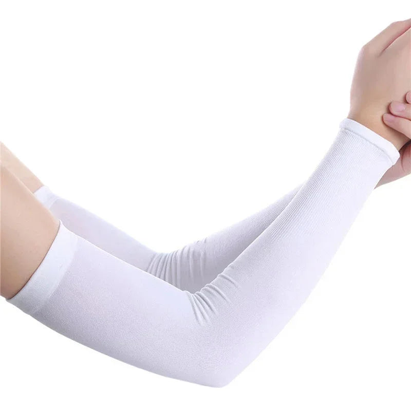 White long sleeve arm sleeves being worn on an arm.
