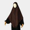 A dark brown square scarf for Islamic wear displayed on a mannequin.