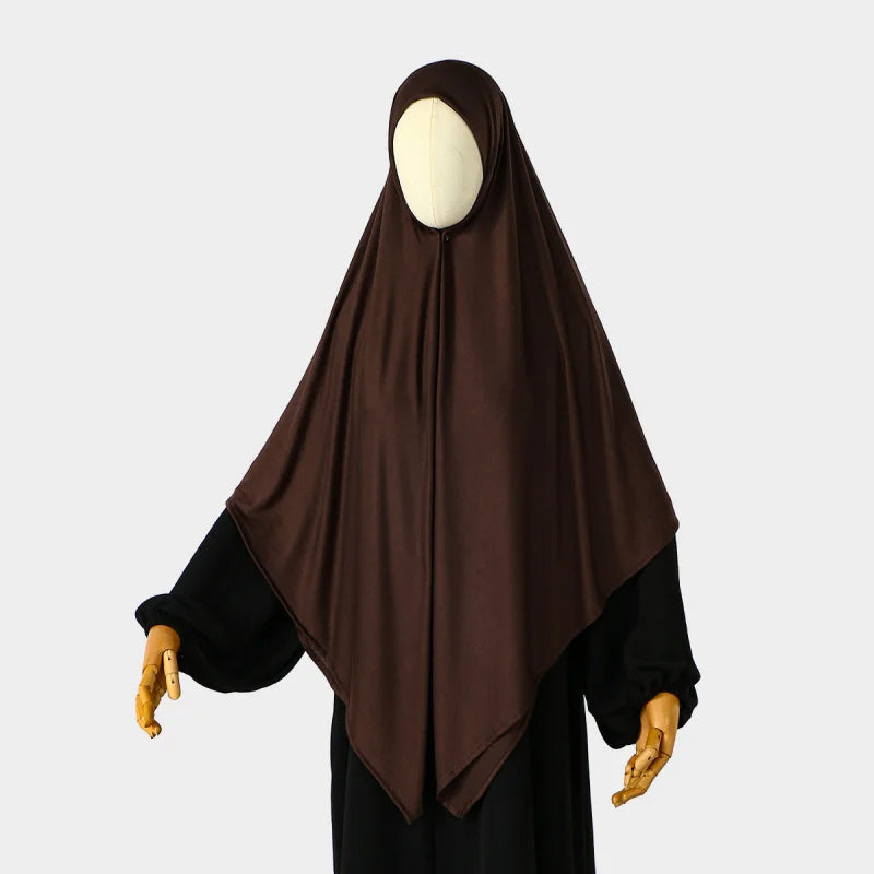 A dark brown square scarf for Islamic wear displayed on a mannequin.