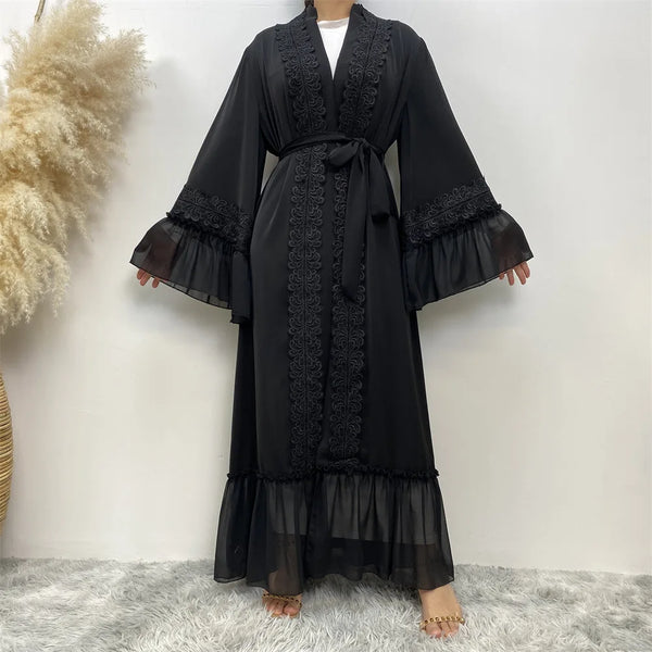 Black full length abaya with lace detailing and wide sleeves displayed against a white background.