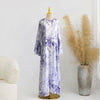 Elegantes Blumenmuster-Abaya und Kaftan-Kleid auf einem Mannequin