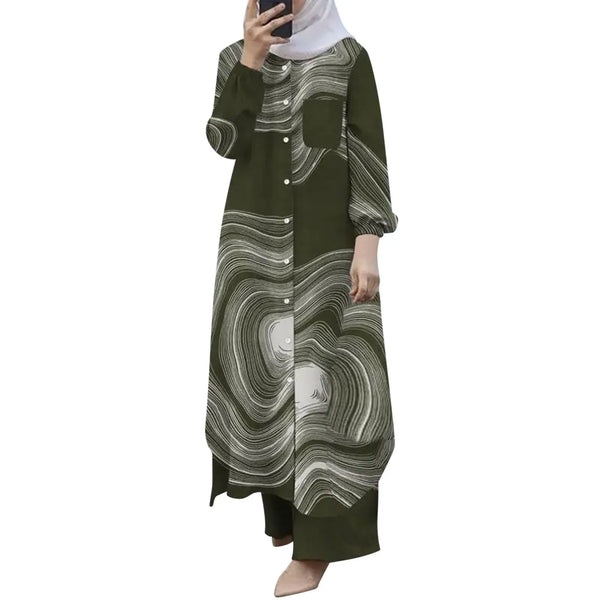 A woman wearing a long, dark olive green patterned abaya set with long sleeves and a button-up front.