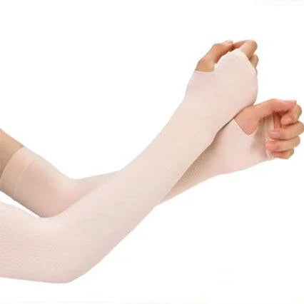 Light pink cooling UV protection arm sleeves worn on an arm.