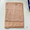 A light beige soft modal rayon hijab set folded flat on a white surface.