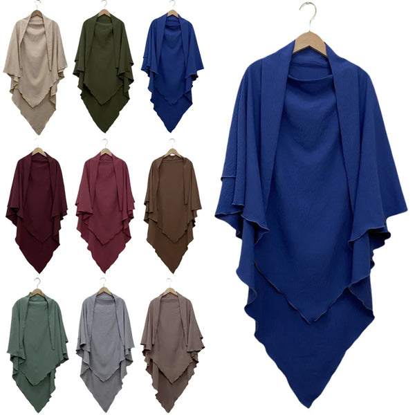 A collection of two-layer everyday hijab scarves in various shades of blue, green, and brown.
