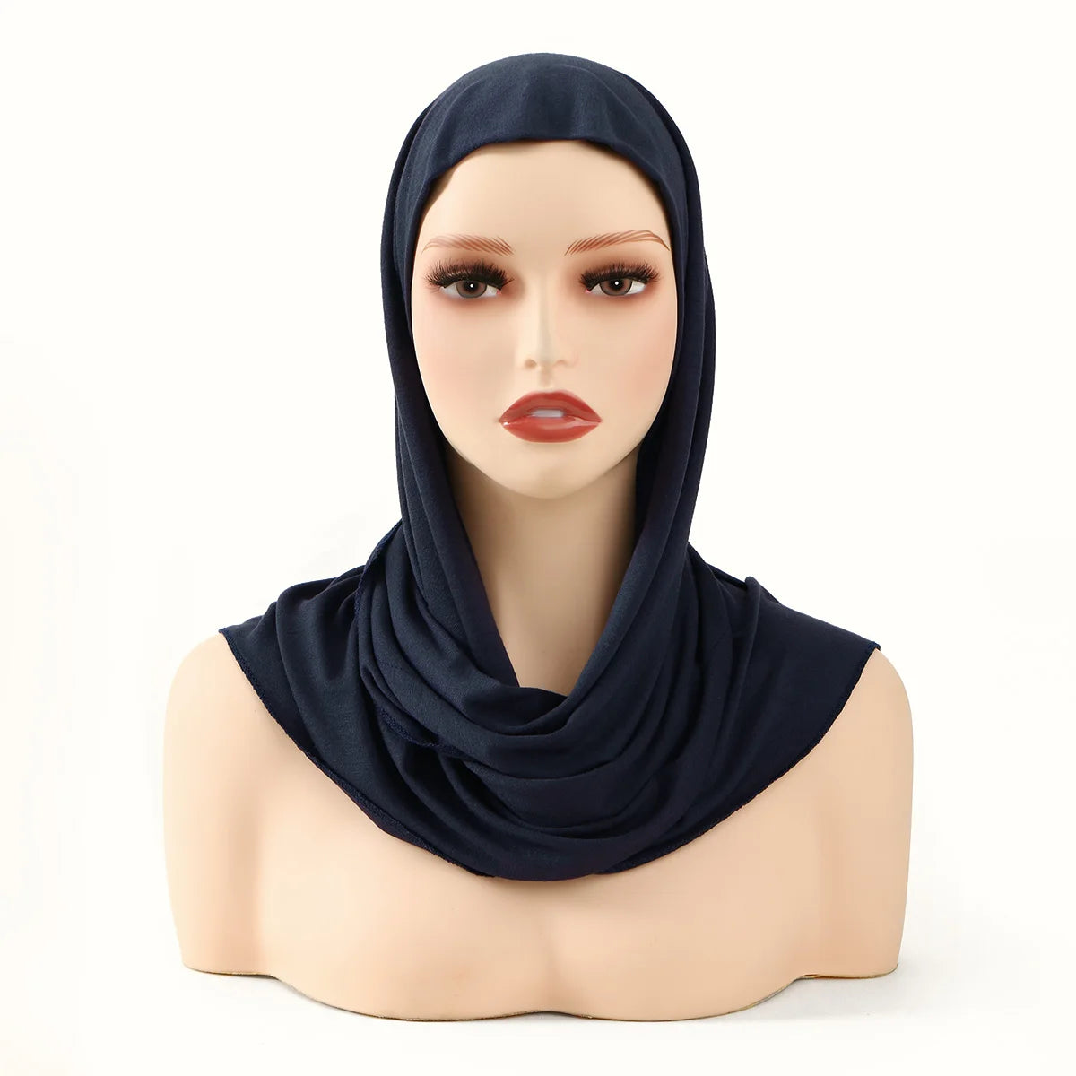 Model wearing a navy blue instant ready-to-wear jersey hijab scarf