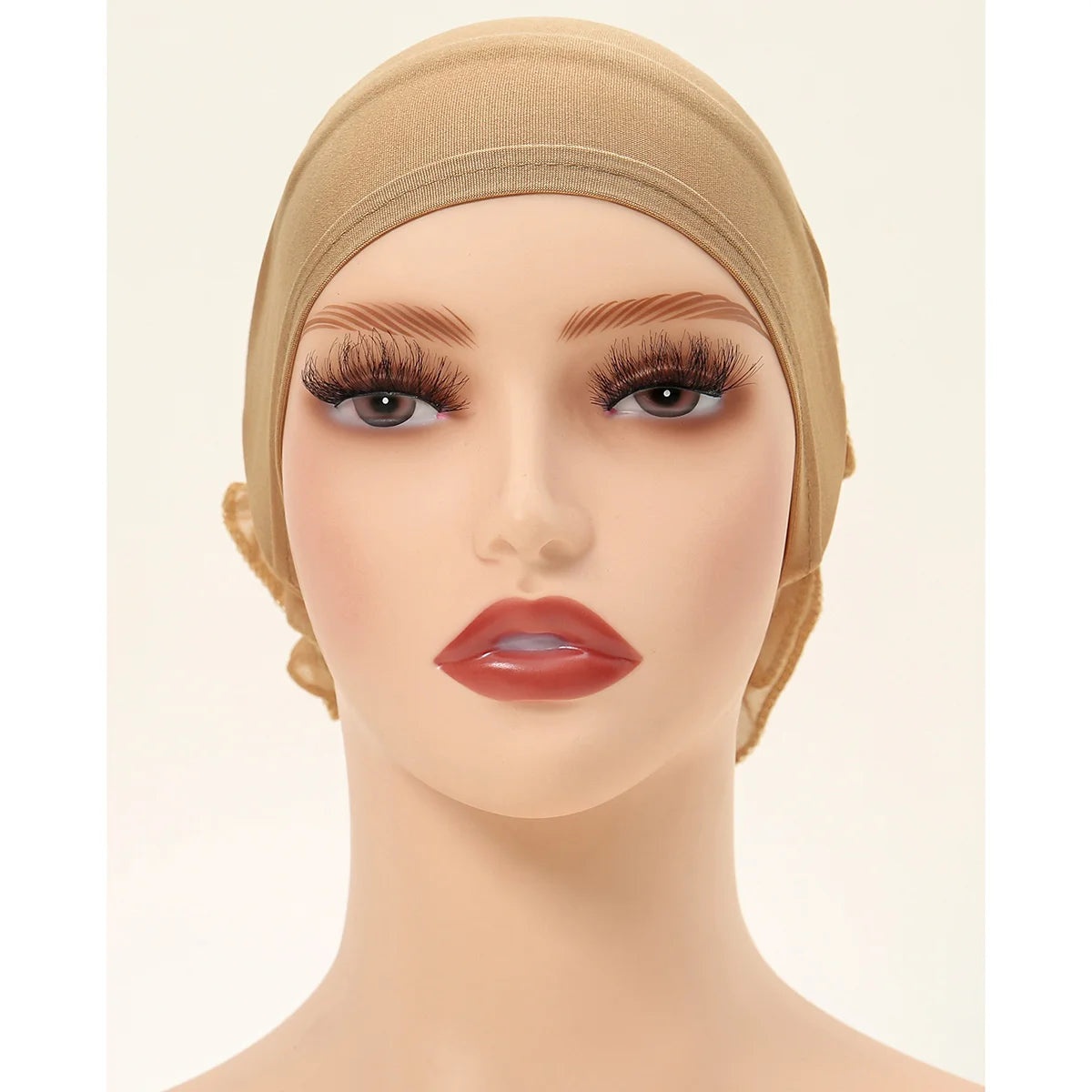 Model wearing a beige lace flower volumizer hijab cap