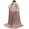 A draped, flowing mauve modal jersey hijab displayed on a mannequin.