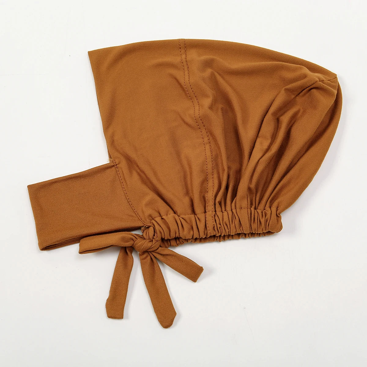 A solid brown elegant cotton polyester inner hijab cap scarf tied at the bottom.