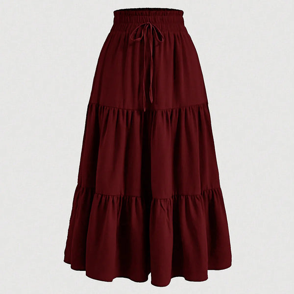 A maroon bohemian A-line midi skirt with a drawstring waist.