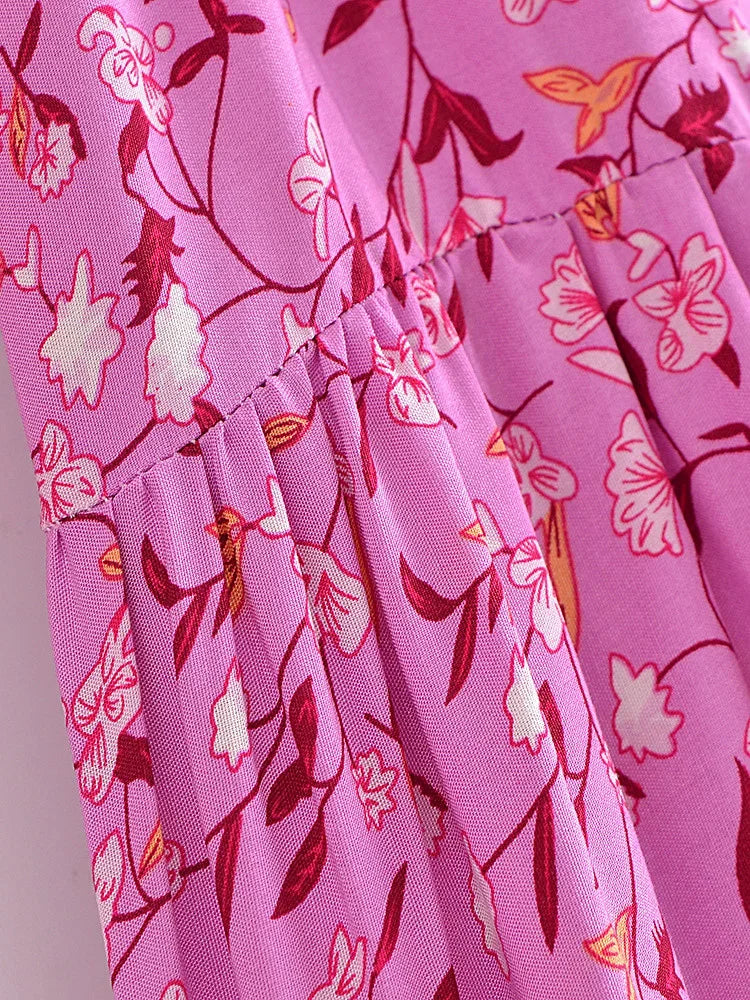 Pink floral print fabric of a boho lantern sleeve maxi dress