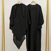 A black elegant two-piece abaya and khimar set displayed on a gold hanger against a white background.
