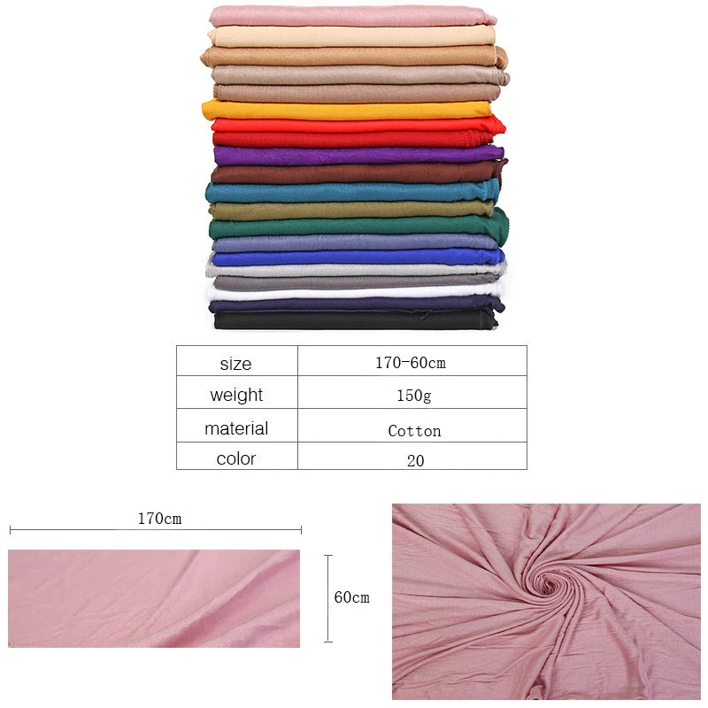 Ein Stapel von 20 rosa und erdtonigen Baumwoll-Hijab-Schals, der Textur und Farbvariationen zeigt.