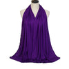 A vibrant purple soft modal jersey hijab scarf draped around a mannequin's neck.