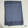 A folded soft blue hijab set made of modal rayon fabric.