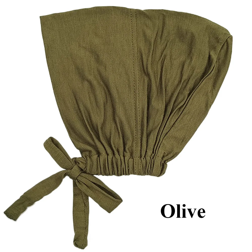 Pañuelo elegante tipo turbante modal color oliva atado con un lazo de tela
