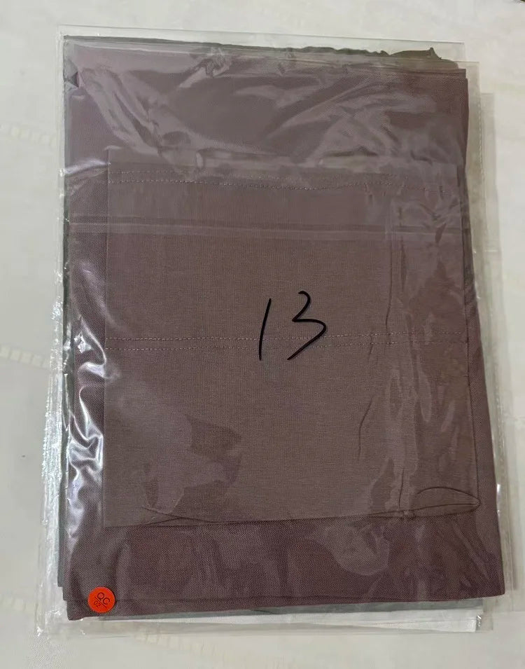 A folded mauve soft modal rayon hijab set for women packaged in clear plastic.
