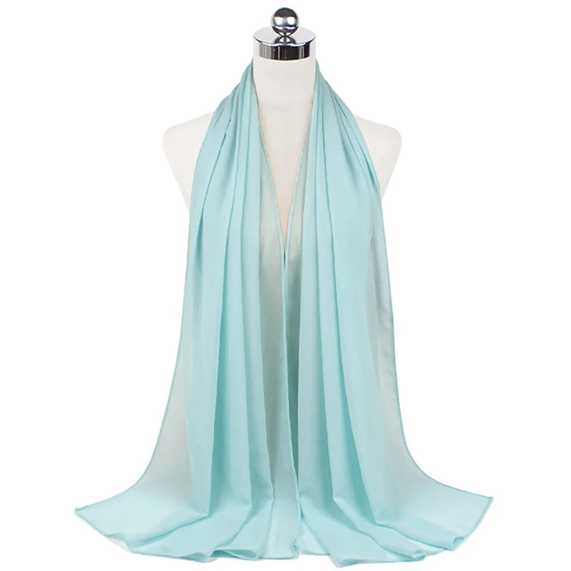 Light blue chiffon hijab scarf draped around a mannequin neck