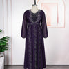 A long-sleeved purple sequin African party dress displayed on a mannequin.